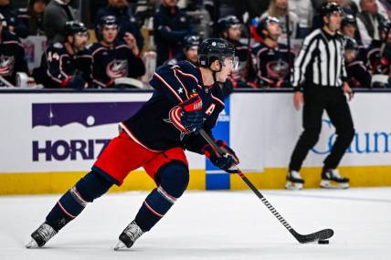 Nov 10, 2022; Columbus, Ohio, USA; Columbus Blue Jackets defenseman Zach Werenski (8) skates with the puck against the Philadelphia Flyers in the first period at Nationwide Arena. Mandatory Credit: Gaelen Morse-USA TODAY Sports