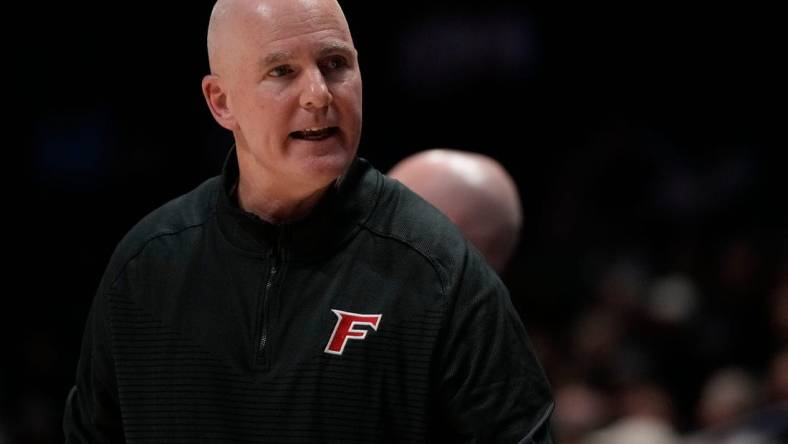 Fairfield Stags head coach Jay Young walks the sideline in the first half of the NCAA basketball game between the Xavier Musketeers and the Fairfield Stags at the Cintas Center in Cincinnati on Tuesday, Nov. 15, 2022.

Fairfield Stags At Xavier Musketeers Basketball