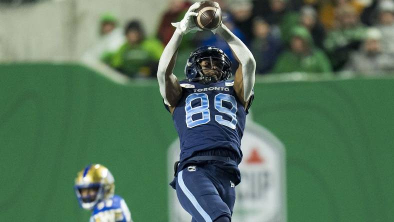 Nov 20, 2022; Regina, Saskatchewan, CAN; Toronto Argonauts receiver Cam Phillips (89) makes a reception against the Winnipeg Blue Bombers in the second half. The Argonauts defeated the Blue Bombers to win the 2022 Grey Cup Championship at Mosaic Stadium. Toronto won 24-23. Mandatory Credit: Bob Frid-USA TODAY Sports