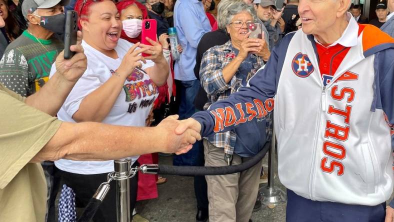 Jim McIngvale, known as Mattress Mack, is greeted by fans outside the newly opened Horseshoe Casino in Westlake, La., on Dec. 12, 2022. McIngvale placed a $1 million cash bet on the Houston Cougars to win the men's Final Four.

Mattress Mack Fans