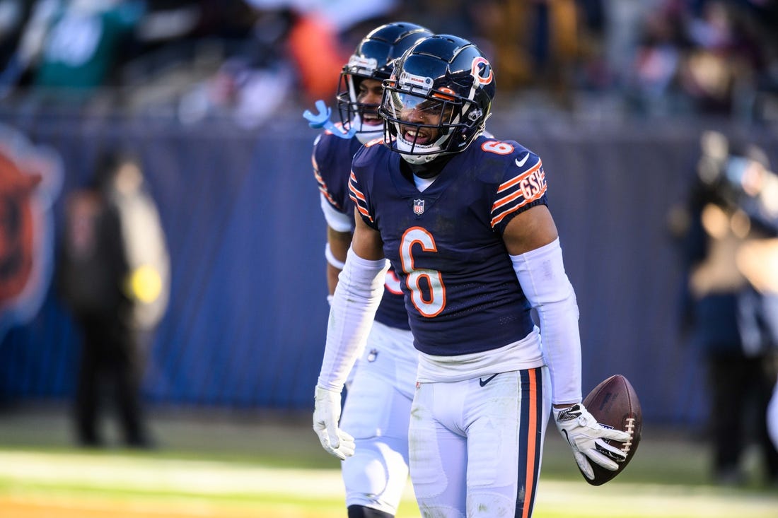 Dec 18, 2022; Chicago, Illinois, USA; Chicago Bears cornerback Kyler Gordon (6) celebrates his fumble recovery in the first quarter against the Philadelphia Eagles at Soldier Field. Mandatory Credit: Daniel Bartel-USA TODAY Sports