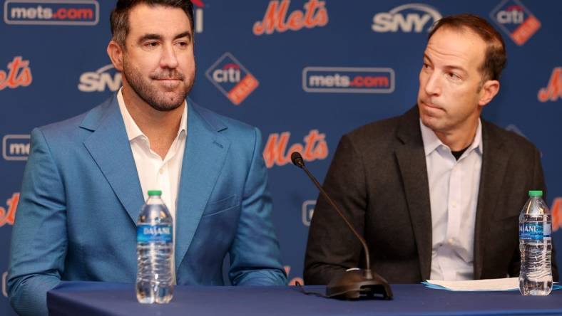 Dec 20, 2022; NY, NY, USA; New York Mets pitcher Justin Verlander (left) speaks to the media with general manager Billy Eppler during a press conference at Citi Field. Mandatory Credit: Brad Penner-USA TODAY Sports