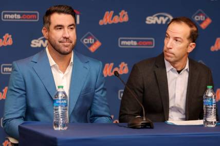 Dec 20, 2022; NY, NY, USA; New York Mets pitcher Justin Verlander (left) speaks to the media with general manager Billy Eppler during a press conference at Citi Field. Mandatory Credit: Brad Penner-USA TODAY Sports