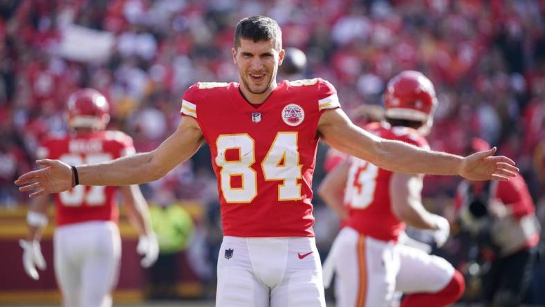 Jan 1, 2023; Kansas City, Missouri, USA; Kansas City Chiefs wide receiver Justin Watson (84) warms up against the Denver Broncos prior to a game at GEHA Field at Arrowhead Stadium. Mandatory Credit: Denny Medley-USA TODAY Sports