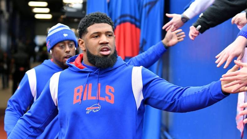 Jan 22, 2023; Orchard Park, New York, USA; Buffalo Bills defensive tackle Ed Oliver (91) high fives fans before an AFC divisional round game between the Buffalo Bills and the Cincinnati Bengals at Highmark Stadium. Mandatory Credit: Mark Konezny-USA TODAY Sports