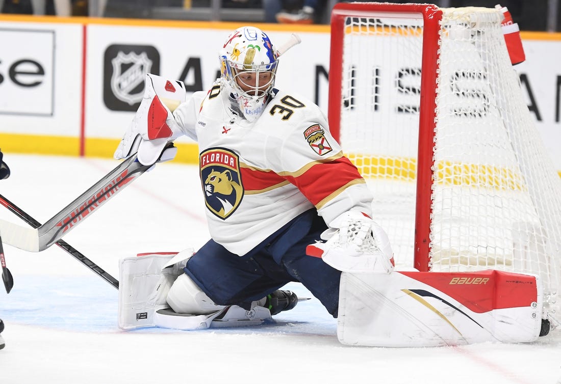 Feb 18, 2023; Nashville, Tennessee, USA; Florida Panthers goaltender Spencer Knight (30) makes a save during the third period against the Nashville Predators at Bridgestone Arena. Mandatory Credit: Christopher Hanewinckel-USA TODAY Sports