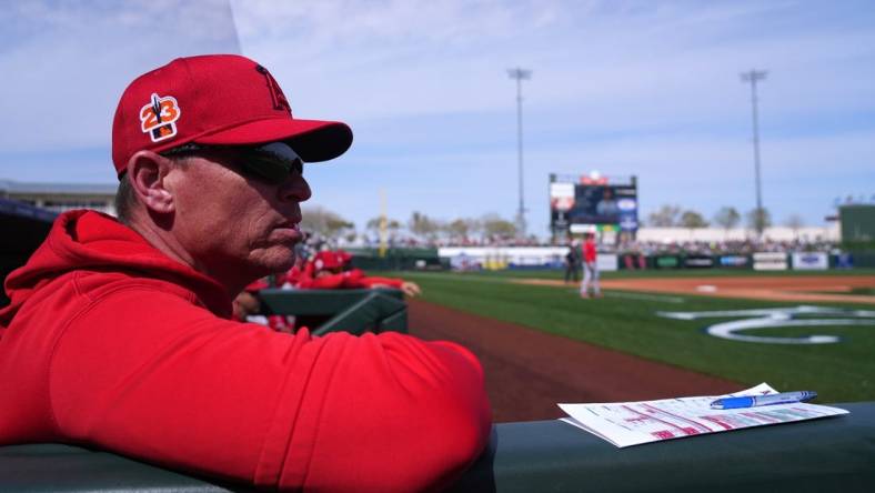 Mar 5, 2023; Surprise, Arizona, USA; Los Angeles Angels acting manager Ray Montgomery (81) looks on against the Texas Rangers during the fourth inning at Surprise Stadium. Mandatory Credit: Joe Camporeale-USA TODAY Sports