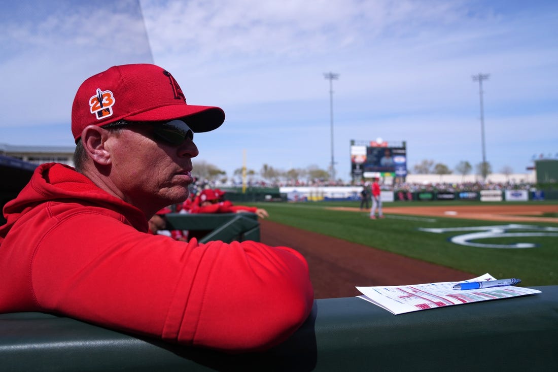 Mar 5, 2023; Surprise, Arizona, USA; Los Angeles Angels acting manager Ray Montgomery (81) looks on against the Texas Rangers during the fourth inning at Surprise Stadium. Mandatory Credit: Joe Camporeale-USA TODAY Sports