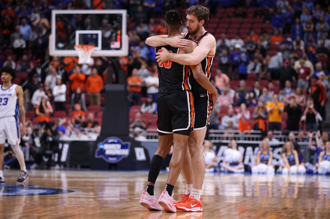 Mar 24, 2023; Louisville, KY, USA; Princeton Tigers forward Tosan Evbuomwan (20) and guard Jack Scott (5) react toward the end of a NCAA tournament round of sixteen loss to the Creighton Bluejays at KFC YUM! Center. Mandatory Credit: Jordan Prather-USA TODAY Sports