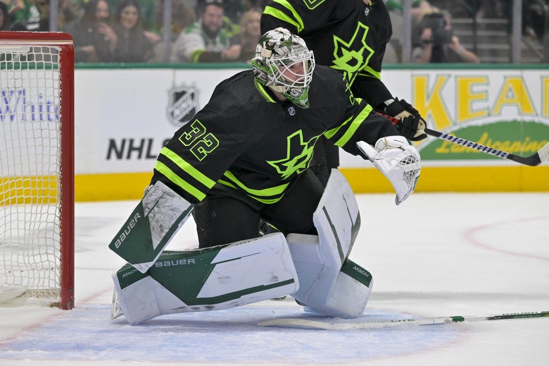 Mar 25, 2023; Dallas, Texas, USA; Dallas Stars goaltender Matt Murray (32) faces the Vancouver Canucks attack during the first period at the American Airlines Center. Mandatory Credit: Jerome Miron-USA TODAY Sports