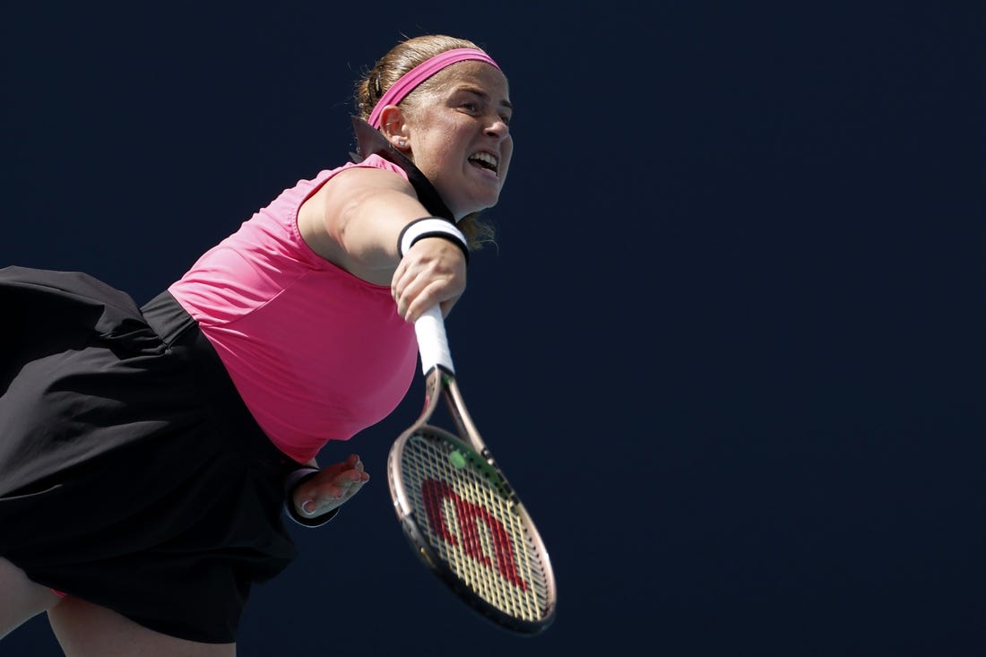 Mar 27, 2023; Miami, Florida, US; Jelena Ostapenko (LAT) serves against Martina Trevisan (ITA) (not pictured) on day eight of the Miami Open at Hard Rock Stadium. Mandatory Credit: Geoff Burke-USA TODAY Sports