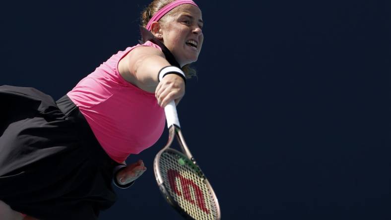 Mar 27, 2023; Miami, Florida, US; Jelena Ostapenko (LAT) serves against Martina Trevisan (ITA) (not pictured) on day eight of the Miami Open at Hard Rock Stadium. Mandatory Credit: Geoff Burke-USA TODAY Sports