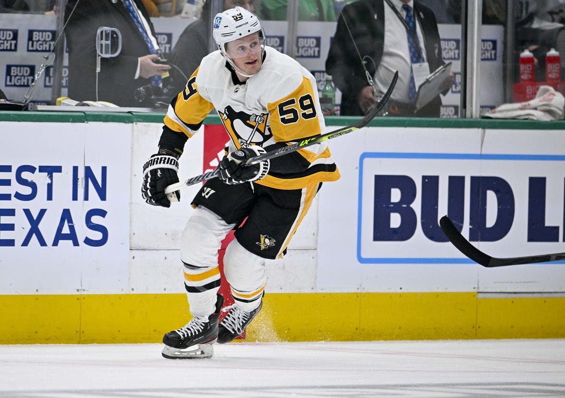 Mar 23, 2023; Dallas, Texas, USA; Pittsburgh Penguins left wing Jake Guentzel (59) in action during the game between the Dallas Stars and the Pittsburgh Penguins at American Airlines Center. Mandatory Credit: Jerome Miron-USA TODAY Sports