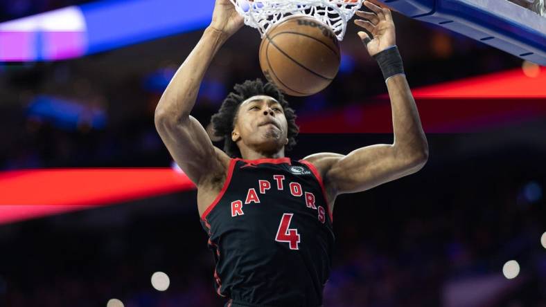 Mar 31, 2023; Philadelphia, Pennsylvania, USA; Toronto Raptors forward Scottie Barnes (4) dunks the ball against the Philadelphia 76ers during the first quarter at Wells Fargo Center. Mandatory Credit: Bill Streicher-USA TODAY Sports