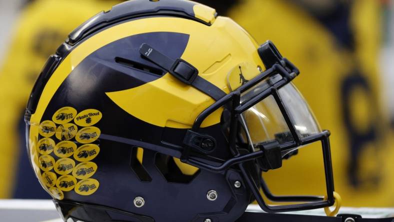 Apr 1, 2023; Ann Arbor, MI, USA;   Michigan Wolverines helmet on the sideline during the Spring Game at Michigan Stadium. Mandatory Credit: Rick Osentoski-USA TODAY Sports