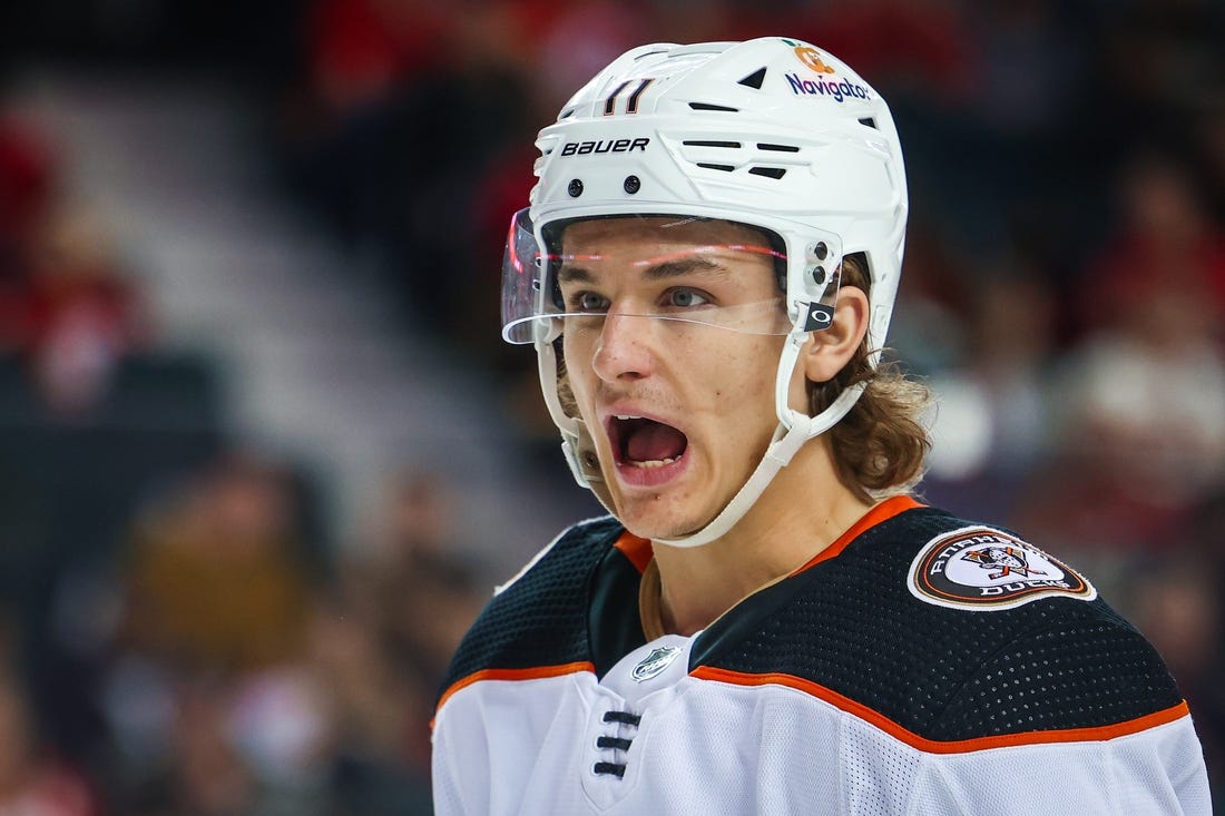 Apr 2, 2023; Calgary, Alberta, CAN; Anaheim Ducks center Trevor Zegras (11) reacts during the third period against the Calgary Flames at Scotiabank Saddledome. Mandatory Credit: Sergei Belski-USA TODAY Sports