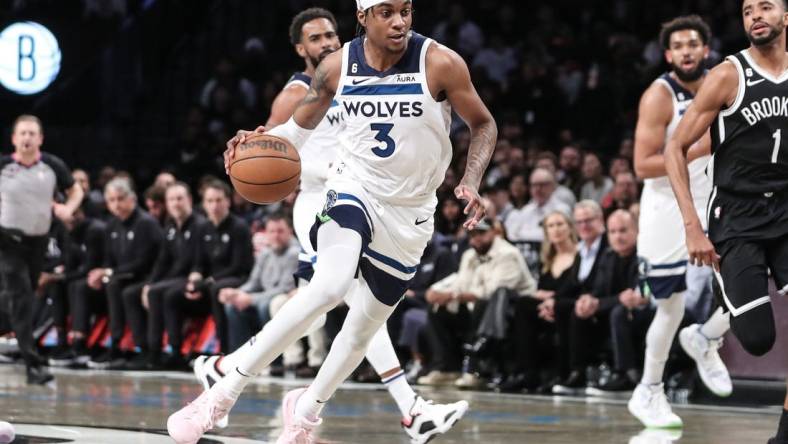 Apr 4, 2023; Brooklyn, New York, USA;  Minnesota Timberwolves forward Jaden McDaniels (3) drives to the basket in the first quarter against the Brooklyn Nets at Barclays Center. Mandatory Credit: Wendell Cruz-USA TODAY Sports