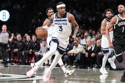 Apr 4, 2023; Brooklyn, New York, USA;  Minnesota Timberwolves forward Jaden McDaniels (3) drives to the basket in the first quarter against the Brooklyn Nets at Barclays Center. Mandatory Credit: Wendell Cruz-USA TODAY Sports