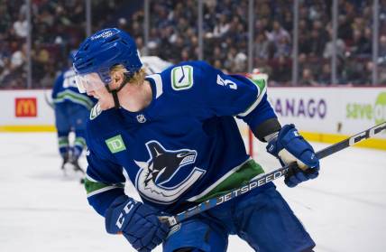Apr 4, 2023; Vancouver, British Columbia, CAN; Vancouver Canucks defenseman Jack Rathbone (3) skates against the Seattle Kraken in the third period at Rogers Arena. Mandatory Credit: Bob Frid-USA TODAY Sports