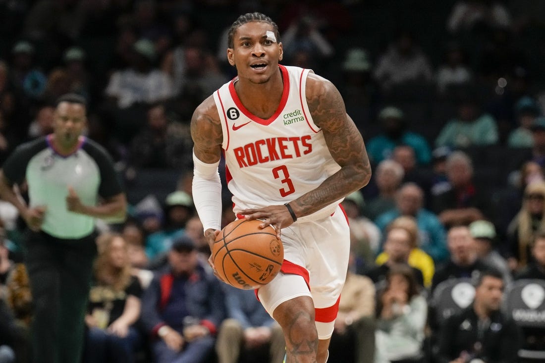 Apr 7, 2023; Charlotte, North Carolina, USA; Houston Rockets guard Kevin Porter Jr. (3) brings the ball up court during the first quarter against the Charlotte Hornets at the Spectrum Center. Mandatory Credit: Jim Dedmon-USA TODAY Sports