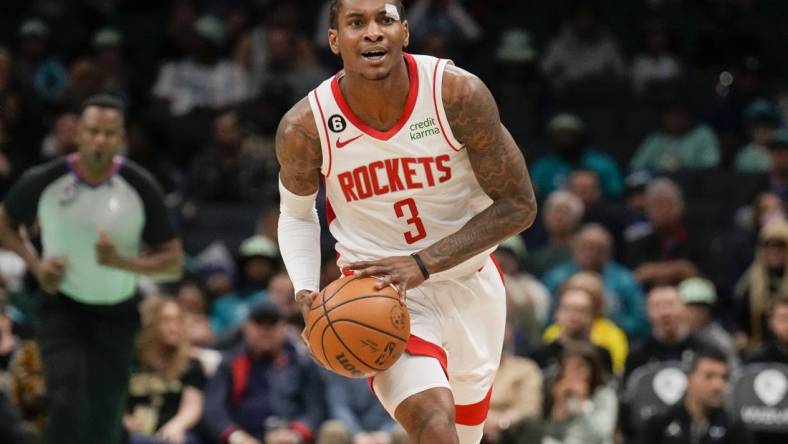 Apr 7, 2023; Charlotte, North Carolina, USA; Houston Rockets guard Kevin Porter Jr. (3) brings the ball up court during the first quarter against the Charlotte Hornets at the Spectrum Center. Mandatory Credit: Jim Dedmon-USA TODAY Sports