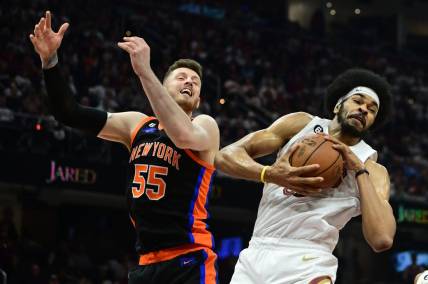 Apr 18, 2023; Cleveland, Ohio, USA; Cleveland Cavaliers center Jarrett Allen (31) grabs a rebound ahead of New York Knicks center Isaiah Hartenstein (55) during the second quarter of game two of the 2023 NBA playoffs at Rocket Mortgage FieldHouse. Mandatory Credit: Ken Blaze-USA TODAY Sports