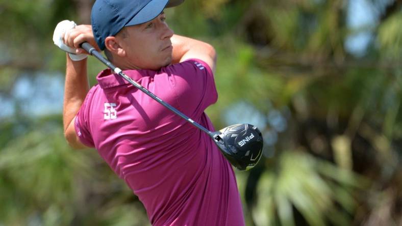 Vince India of Chicago, IL, tees off on the par five, tenth hole at Lakewood National Golf Club on Thursday, April 20, 2023 during the first round of the Korn Ferry Tour's LECOM Suncoast Classic golf tournament.

Sar Lecom Golf 014