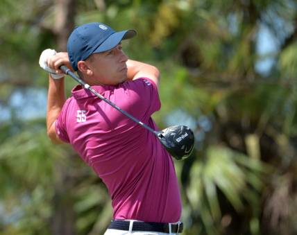 Vince India of Chicago, IL, tees off on the par five, tenth hole at Lakewood National Golf Club on Thursday, April 20, 2023 during the first round of the Korn Ferry Tour's LECOM Suncoast Classic golf tournament.

Sar Lecom Golf 014