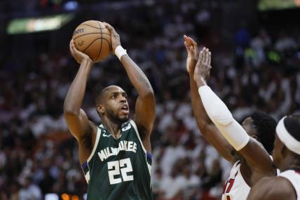 Apr 22, 2023; Miami, Florida, USA; Milwaukee Bucks forward Khris Middleton (22) shoots the basketball in the second quarter against the Miami Heat during game three of the 2023 NBA Playoffs at Kaseya Center. Mandatory Credit: Sam Navarro-USA TODAY Sports