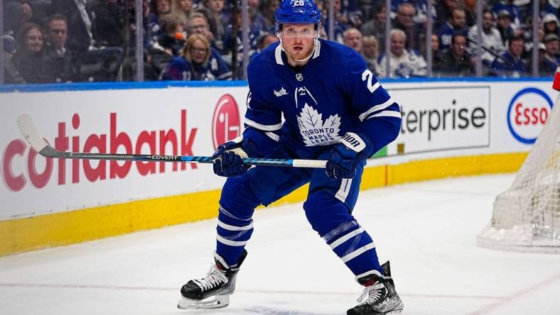 May 4, 2023; Toronto, Ontario, CANADA; Toronto Maple Leafs forward Sam Lafferty (28) looks for the puck against the Florida Panthers during game two of the second round of the 2023 Stanley Cup Playoffs at Scotiabank Arena. Mandatory Credit: John E. Sokolowski-USA TODAY Sports