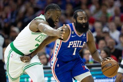 May 11, 2023; Philadelphia, Pennsylvania, USA; Philadelphia 76ers guard James Harden (1) dribbles the ball against Boston Celtics guard Jaylen Brown (7) during the first quarter in game six of the 2023 NBA playoffs at Wells Fargo Center. Mandatory Credit: Bill Streicher-USA TODAY Sports
