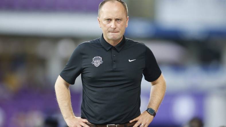 May 20, 2023; Orlando, Florida, USA; Washington Spirit head coach Mark Parsons reacts in the first half against the Orlando Pride at Exploria Stadium. Mandatory Credit: Russel Lansford-USA TODAY Sports