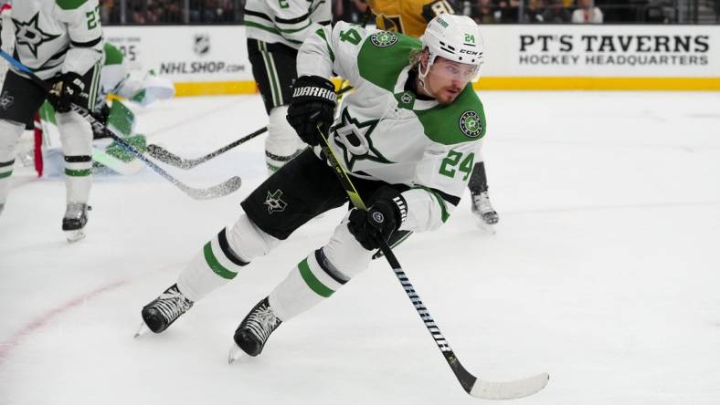 May 27, 2023; Las Vegas, Nevada, USA; Dallas Stars center Roope Hintz (24) skates with the puck against the Vegas Golden Knights during the second period in game five of the Western Conference Finals of the 2023 Stanley Cup Playoffs at T-Mobile Arena. Mandatory Credit: Stephen R. Sylvanie-USA TODAY Sports