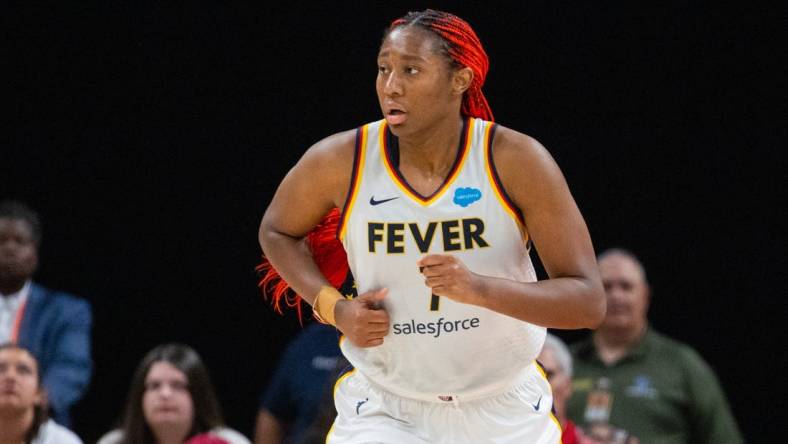 Jun 4, 2023; Indianapolis, Indiana, USA; Indiana Fever center Aliyah Boston (7) in the second half against the Las Vegas Aces at Gainbridge Fieldhouse. Mandatory Credit: Trevor Ruszkowski-USA TODAY Sports