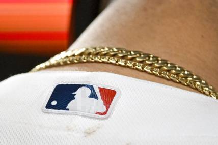 Jun 12, 2023; St. Louis, Missouri, USA;  A detailed view of the MLB logo on the back of St. Louis Cardinals catcher Willson Contreras (40) jersey during the eighth inning against the San Francisco Giants at Busch Stadium. Mandatory Credit: Jeff Curry-USA TODAY Sports