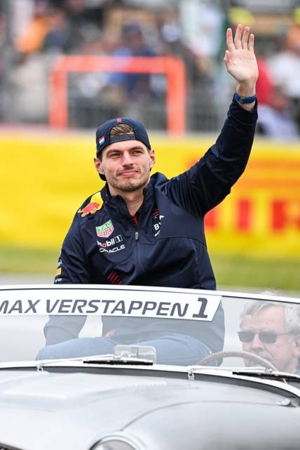 Jun 18, 2023; Montreal, Quebec, CAN; Red Bull Racing driver Max Verstappen (NED) parades and salutes the crowd before the Canadian Grand Prix at Circuit Gilles Villeneuve. Mandatory Credit: David Kirouac-USA TODAY Sports