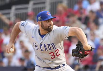 Jun 25, 2023; London, GBR, ENG;  Chicago Cubs relief pitcher Michael Fulmer (32) throws against the St. Louis Cardinals  in London series game two at London Stadium. Mandatory Credit: Peter van den Berg-USA TODAY Sports