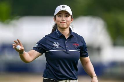 Jun 25, 2023; Springfield, New Jersey, USA; Ruoning Yin reacts on the 18th hole during the final round of the KPMG Women's PGA Championship golf tournament. Mandatory Credit: John Jones-USA TODAY Sports