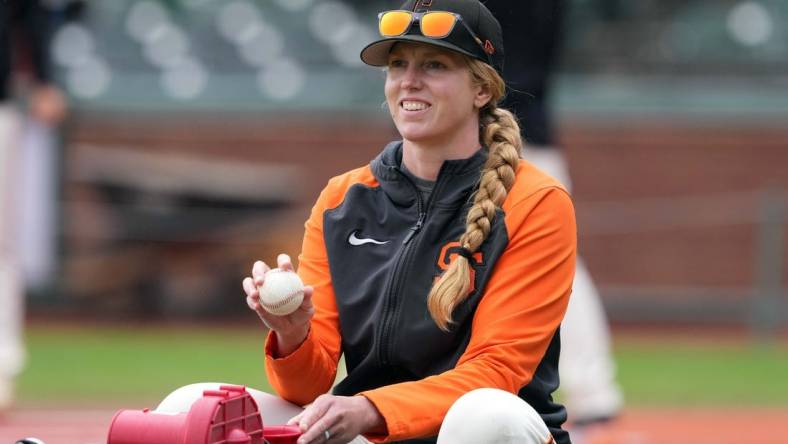 Jun 25, 2023; San Francisco, California, USA; San Francisco Giants major league assistant coach Alyssa Nakken (92) works on the field before the game against the Arizona Diamondbacks at Oracle Park. Mandatory Credit: Darren Yamashita-USA TODAY Sports