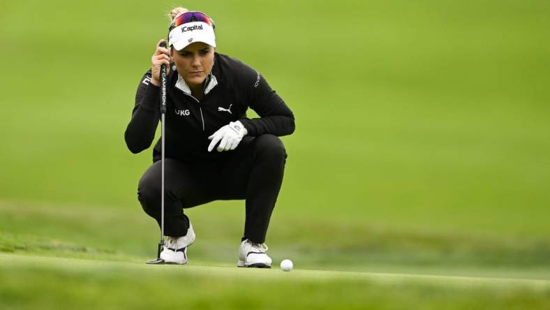 Jul 6, 2023; Pebble Beach, California, USA; Lexi Thompson lines up her putt on the 16th hole during the first round of the U.S. Women's Open golf tournament at Pebble Beach Golf Links. Mandatory Credit: Kelvin Kuo-USA TODAY Sports