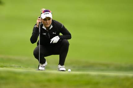 Jul 6, 2023; Pebble Beach, California, USA; Lexi Thompson lines up her putt on the 16th hole during the first round of the U.S. Women's Open golf tournament at Pebble Beach Golf Links. Mandatory Credit: Kelvin Kuo-USA TODAY Sports