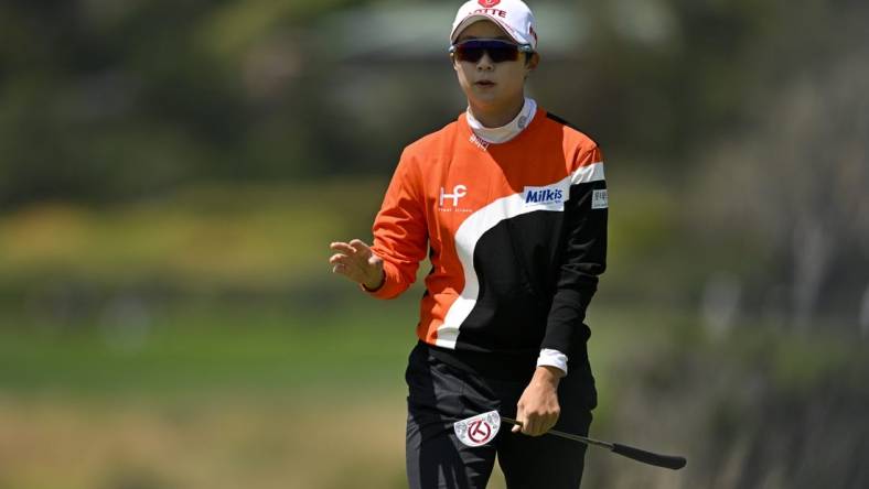 Jul 8, 2023; Pebble Beach, California, USA; Hyo Joo Kim reacts after her putt on the fifth hole during the third round of the U.S. Women's Open golf tournament at Pebble Beach Golf Links. Mandatory Credit: Kelvin Kuo-USA TODAY Sports