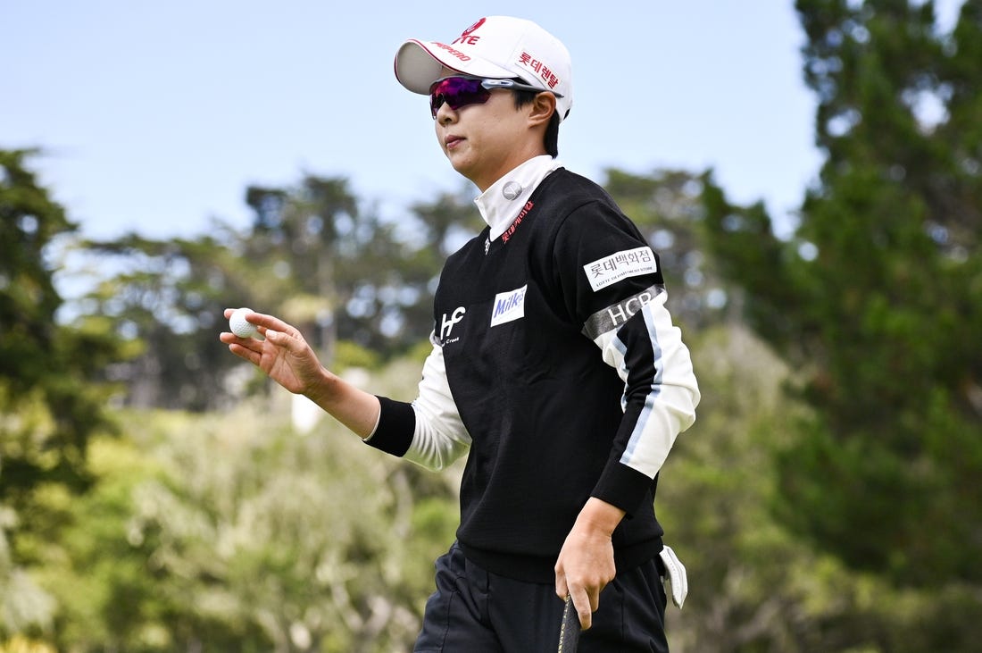 Jul 9, 2023; Pebble Beach, California, USA; Hyo Joo Kim acknowledges the crowd after her putt on the second hole  during the final round of the U.S. Women's Open golf tournament at Pebble Beach Golf Links. Mandatory Credit: Kelvin Kuo-USA TODAY Sports