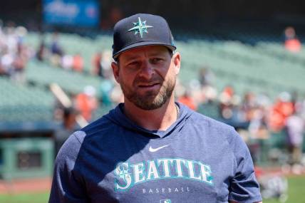 Jul 4, 2023; San Francisco, California, USA; Seattle Mariners bullpen coach and quality control coach Stephen Vogt (13) walks on the field before the game against the San Francisco Giants at Oracle Park. Mandatory Credit: Robert Edwards-USA TODAY Sports