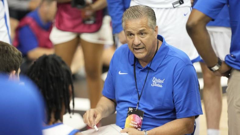 Jul 16, 2023; Toronto, Ontario, Canada; USA-Kentucky head coach John Calipari talks to his players during the first half of the Men's Gold game against Canada at Mattamy Athletic Centre. Mandatory Credit: John E. Sokolowski-USA TODAY Sports