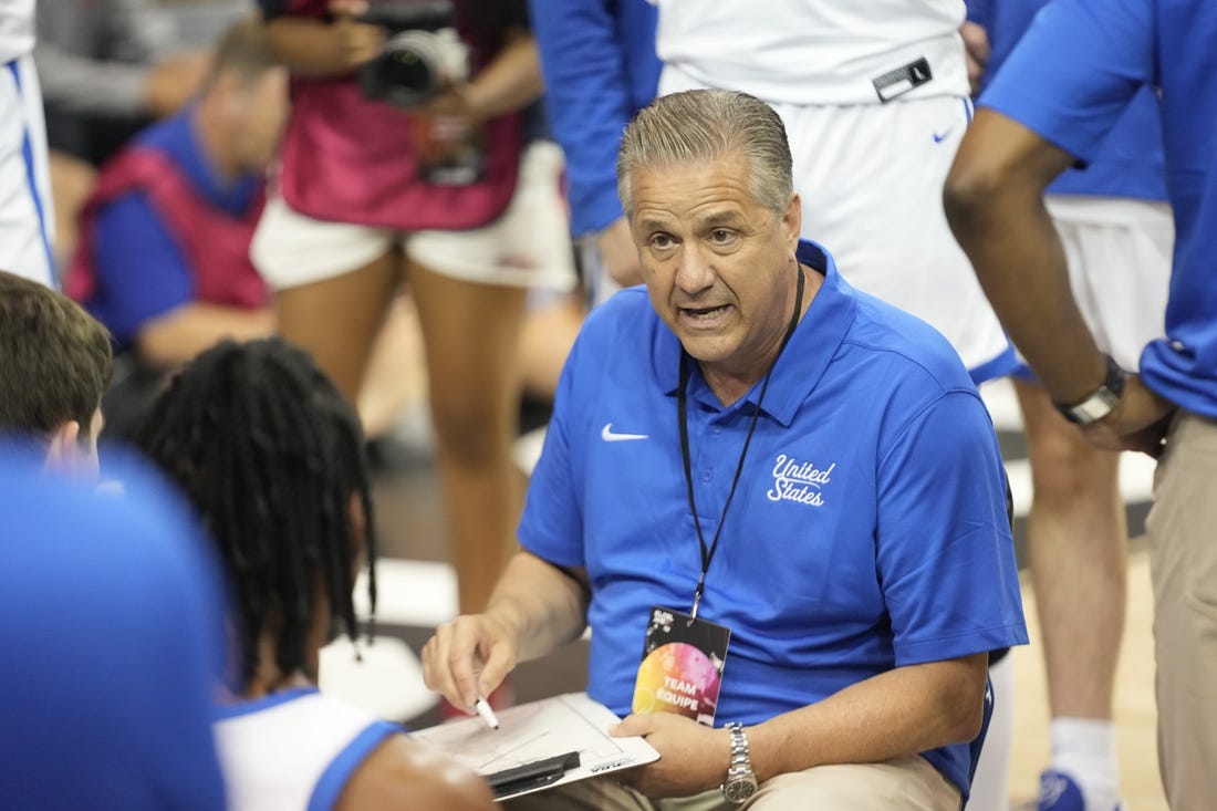 Jul 16, 2023; Toronto, Ontario, Canada; USA-Kentucky head coach John Calipari talks to his players during the first half of the Men's Gold game against Canada at Mattamy Athletic Centre. Mandatory Credit: John E. Sokolowski-USA TODAY Sports