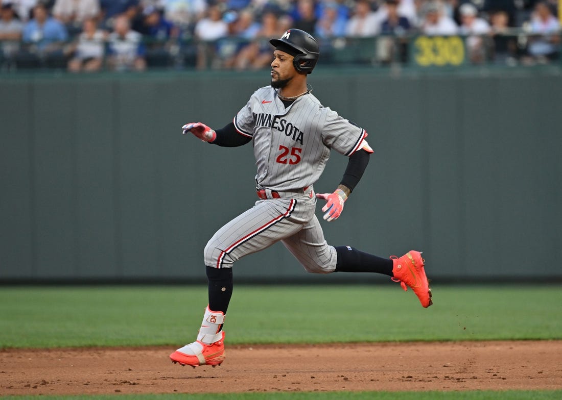 Jul 29, 2023; Kansas City, Missouri, USA;  Minnesota Twins designated hitter Byron Buxton (25) doubles during the sixth inning against the Kansas City Royals at Kauffman Stadium. Mandatory Credit: Peter Aiken-USA TODAY Sports