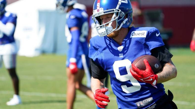 New York Giants wide receiver Cole Beasley runs with the ball during training camp in East Rutherford on Monday, July 31, 2023.