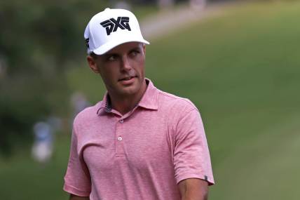 Aug 5, 2023; Greensboro, North Carolina, USA; Eric Cole on the 18th green during the third round of the Wyndham Championship golf tournament. Mandatory Credit: David Yeazell-USA TODAY Sports