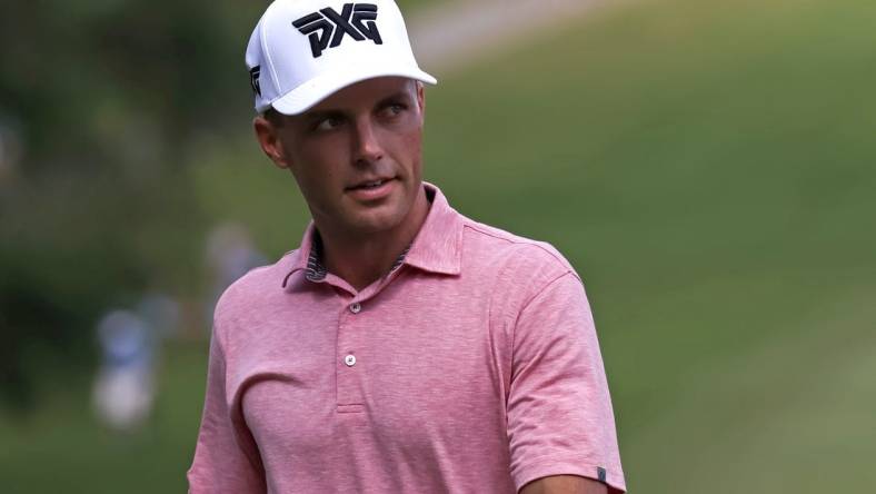 Aug 5, 2023; Greensboro, North Carolina, USA; Eric Cole on the 18th green during the third round of the Wyndham Championship golf tournament. Mandatory Credit: David Yeazell-USA TODAY Sports